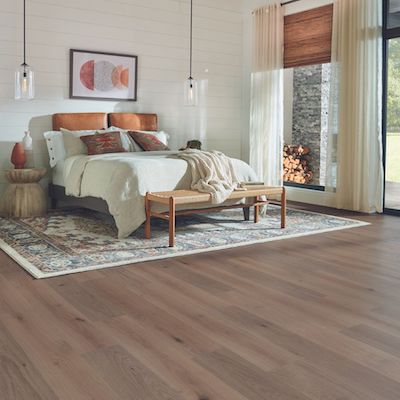 laminate flooring in a rustic bedroom